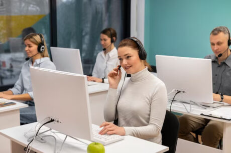 colleagues-with-headphones-working-call-center-office_23-2149256154